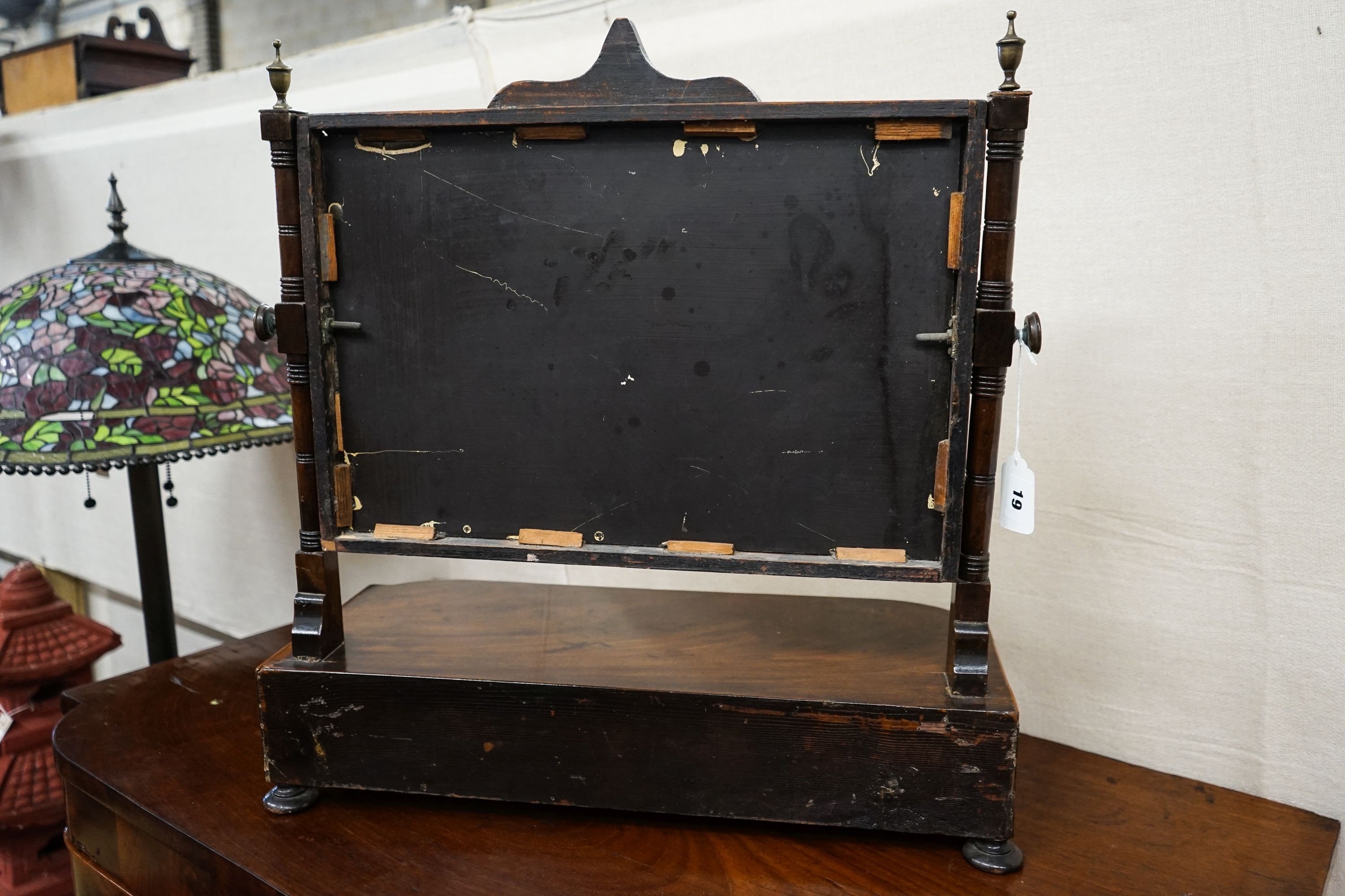 A George IV mahogany toilet mirror, with three drawer box base, width 58cm, depth 24cm, height 59cm